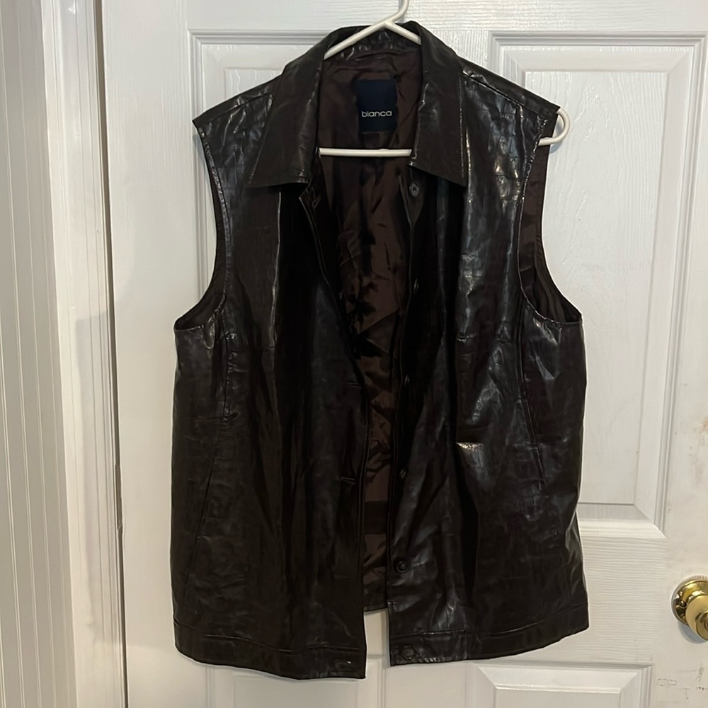 Leather sleeveless brown jacket